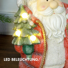 Laden Sie das Bild in den Galerie-Viewer, Weihnachtsmannfigur mit Baum und Geschenk, 3 warmweiße LEDs, batteriebetrieben, 50 cm