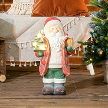 Laden Sie das Bild in den Galerie-Viewer, Weihnachtsmannfigur mit Baum und Geschenk, 3 warmweiße LEDs, batteriebetrieben, 50 cm