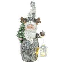 Laden Sie das Bild in den Galerie-Viewer, Weihnachtsdeko, Weihnachtsmann mit Tanne und Laterne, warme LED-Beleuchtung, Batteriebetrieb, In- und Outdoor, 55 cm