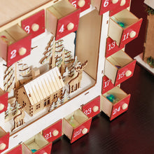Laden Sie das Bild in den Galerie-Viewer, Adventskalender mit Dorfszene, 24 große Schubladen, 34 x 7 x 34 cm, Rot